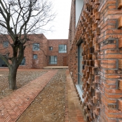 W house - brick wall © Iwan Baan